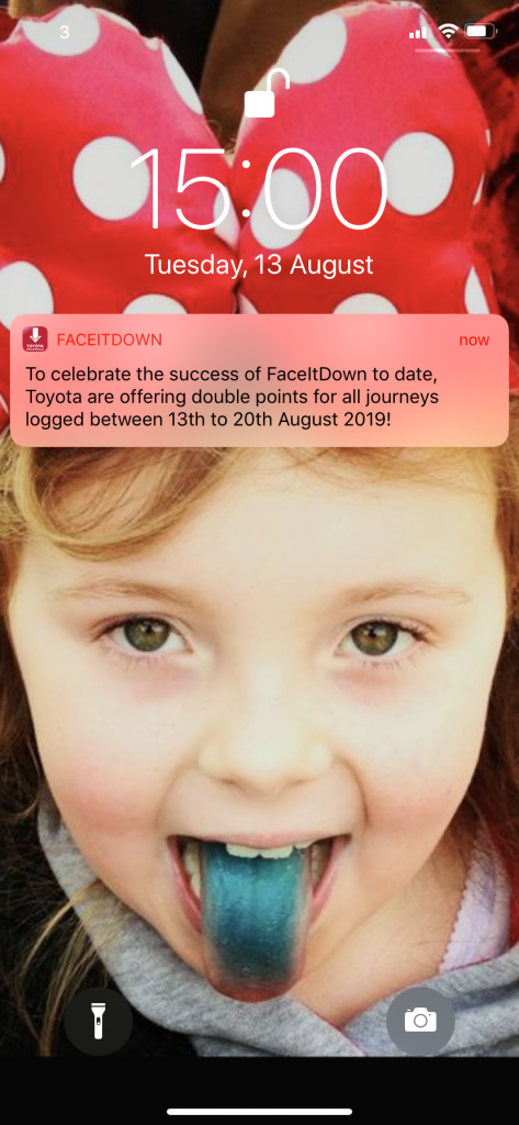in-app communication. Image of push notification from the Toyota FaceItDown App